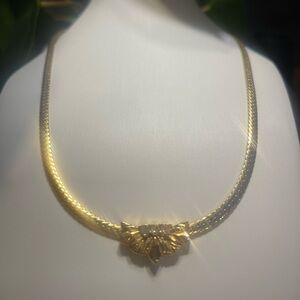 Nina Ricci Gold Necklace with Leaf Motif